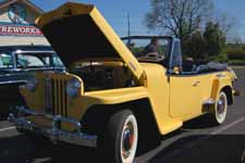 Photo shows grille and front end of a 1948 Willys Overland Jeepster Sports Phaeton