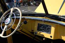 Expertly Restored steering wheel and dashboard in a 1948 Willys Overland Jeepster