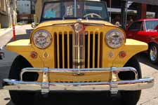 Perfectly restored front grille and stainless steel trim piece on a 1949 Willys Overland Jeepster