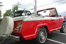 Factory stock Champagne White #432 and President Red #398 paint job on a 1969 Jeep Jeepster Commando