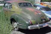 Complete and stock 1941 Buick Roadmaster coupe in classic salvage yard