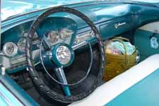 Close-up photo of unique Teletouch transmission selector buttons in the center of 1958 Edsel Station Wagon steering wheel