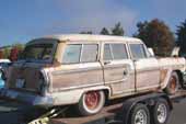 Restorable 1950's Mercury woodie wagon in vintage car storage lot