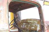 Dashboard and interior detail in 1936 Chevy truck in vintage car salvage yard