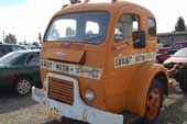 Very unique White cab-over-engine truck cab in vintage truck storage yard